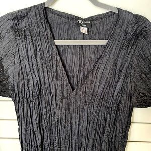 New. Never worn. Very versatile. No need to iron.